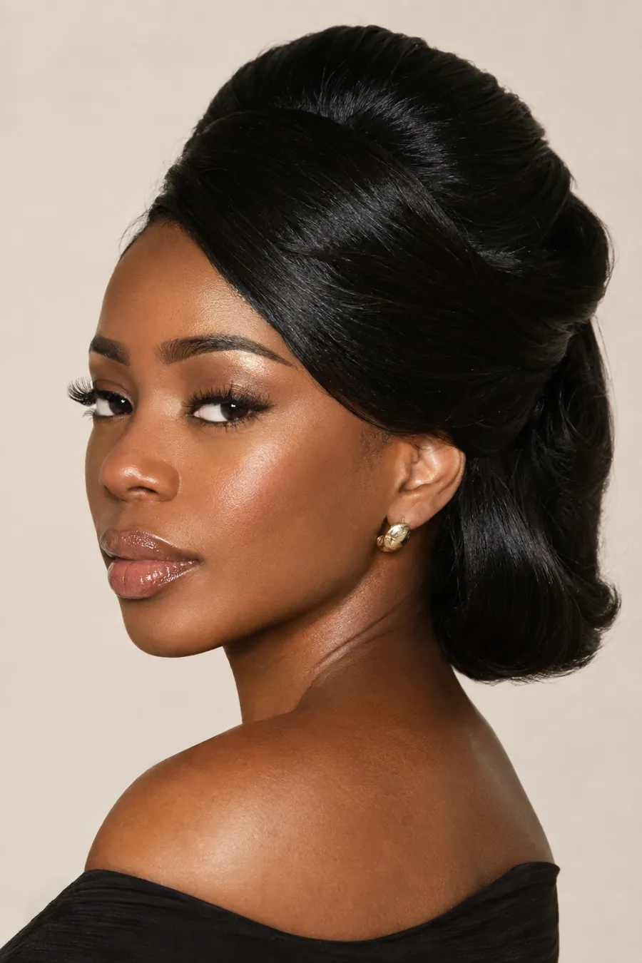 Woman with a smooth, classic doobie wrap hairstyle